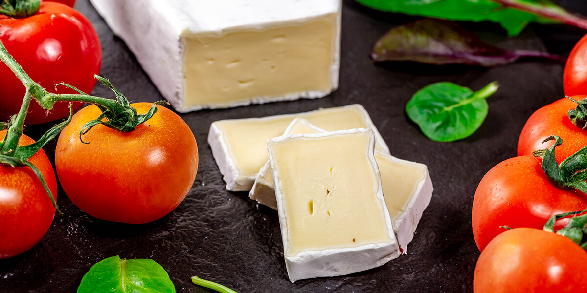 Brie with tomatoes and herbs.