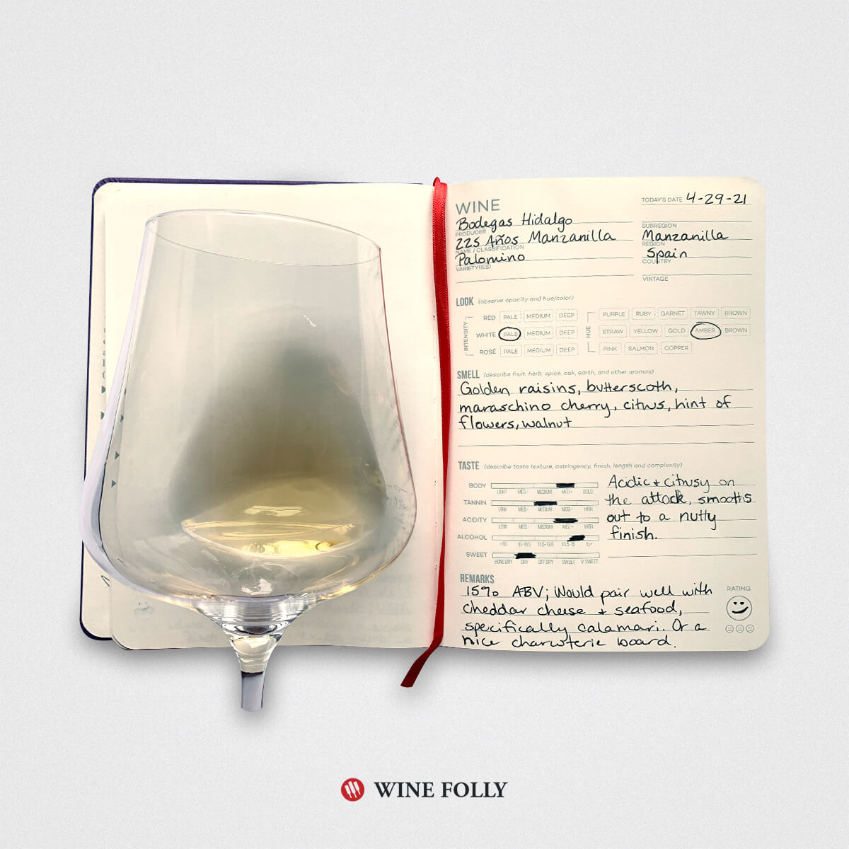 open wine journal with an entry about sherry