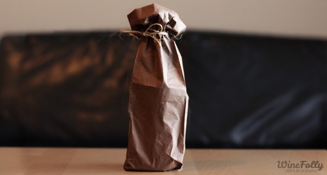 Wine Bottle in a paper bag tied with string for a blind tasting